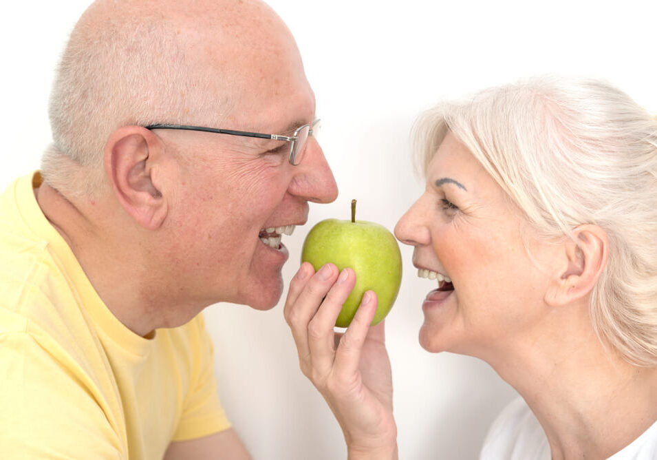 couple eating an apple
